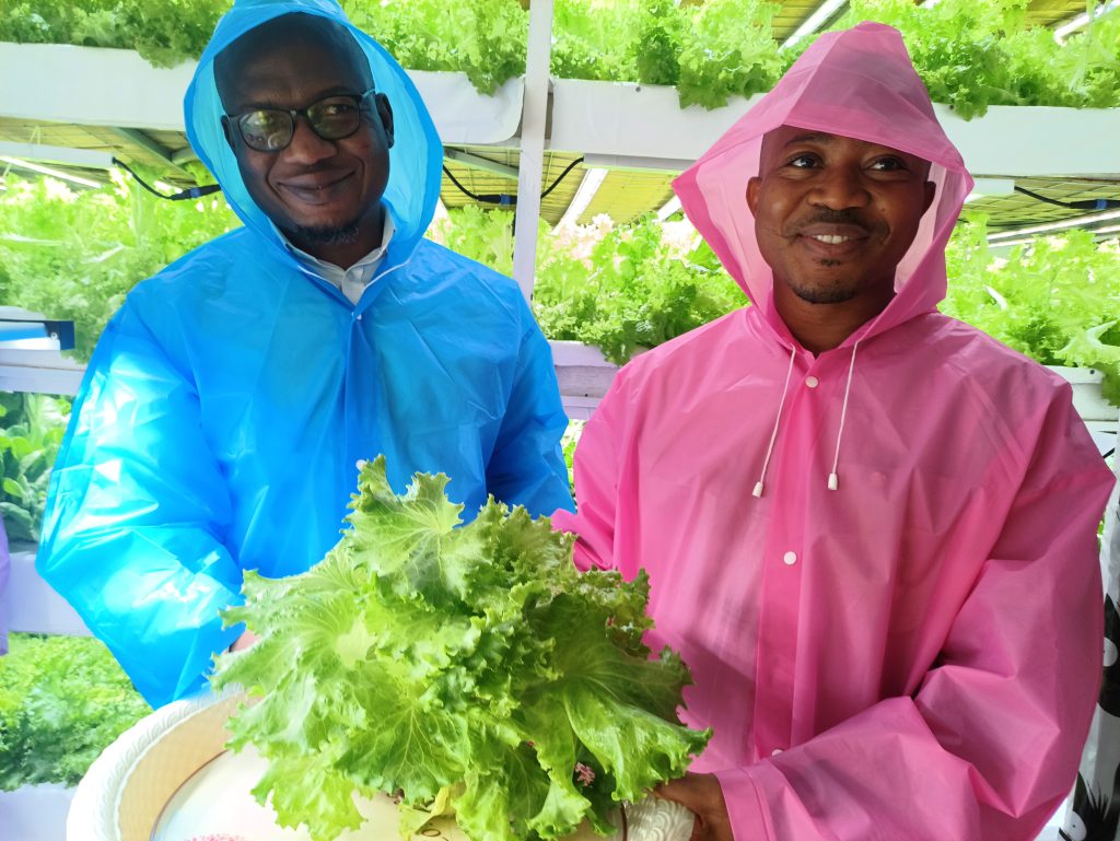 On the right stands Kamil Nabong, the Incubator Portfolio Manager, while on the left is Titus Beyuoh, the Business Development Manager at Kosmos Innovation Center